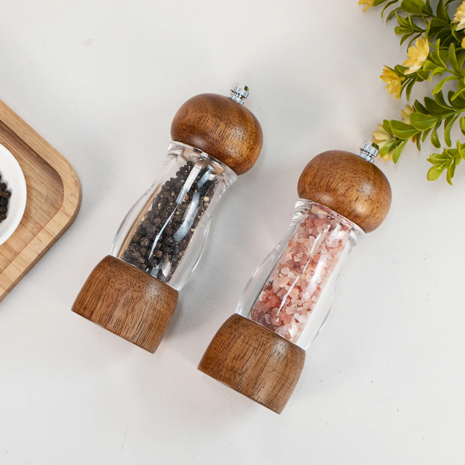 Haomacro wooden salt and pepper grinder set on a warm kitchen surface